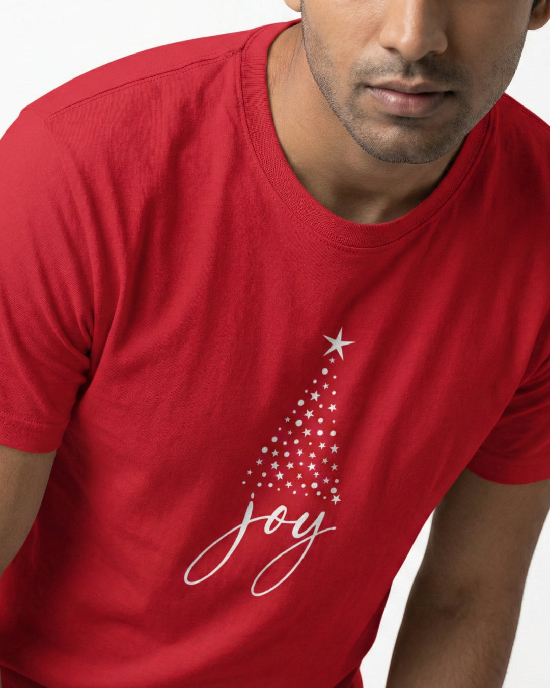 Red t-shirt with Christmas tree design and 'joy' text worn by a person