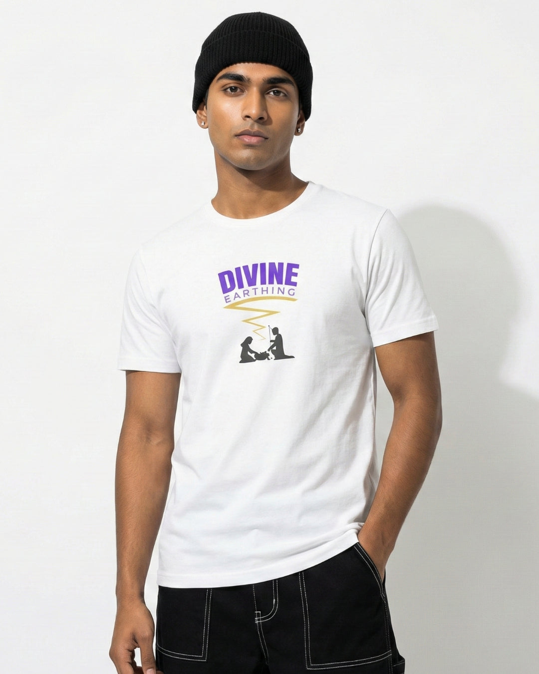 Man wearing a white t-shirt with 'Divine' logo on a plain background